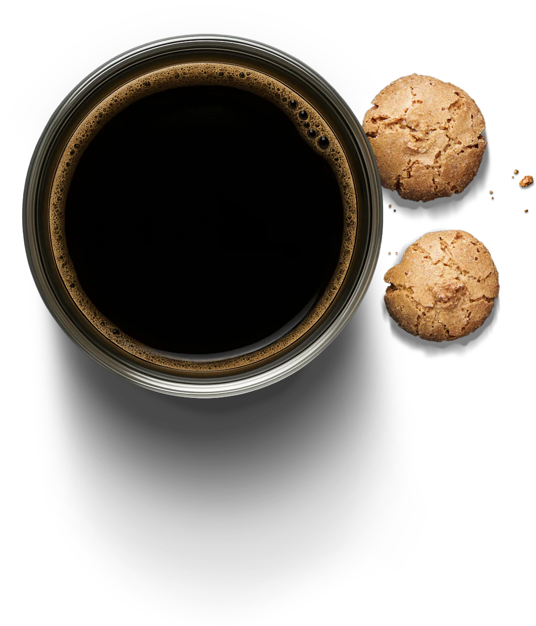 A glass of black coffee with a couple of amaretti cookies nearby